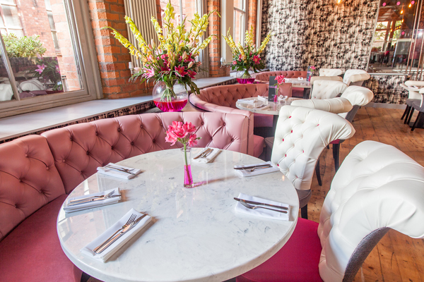 Manchester restaurant Mcr 42 - White marble tables with pink and grey colour scheme.